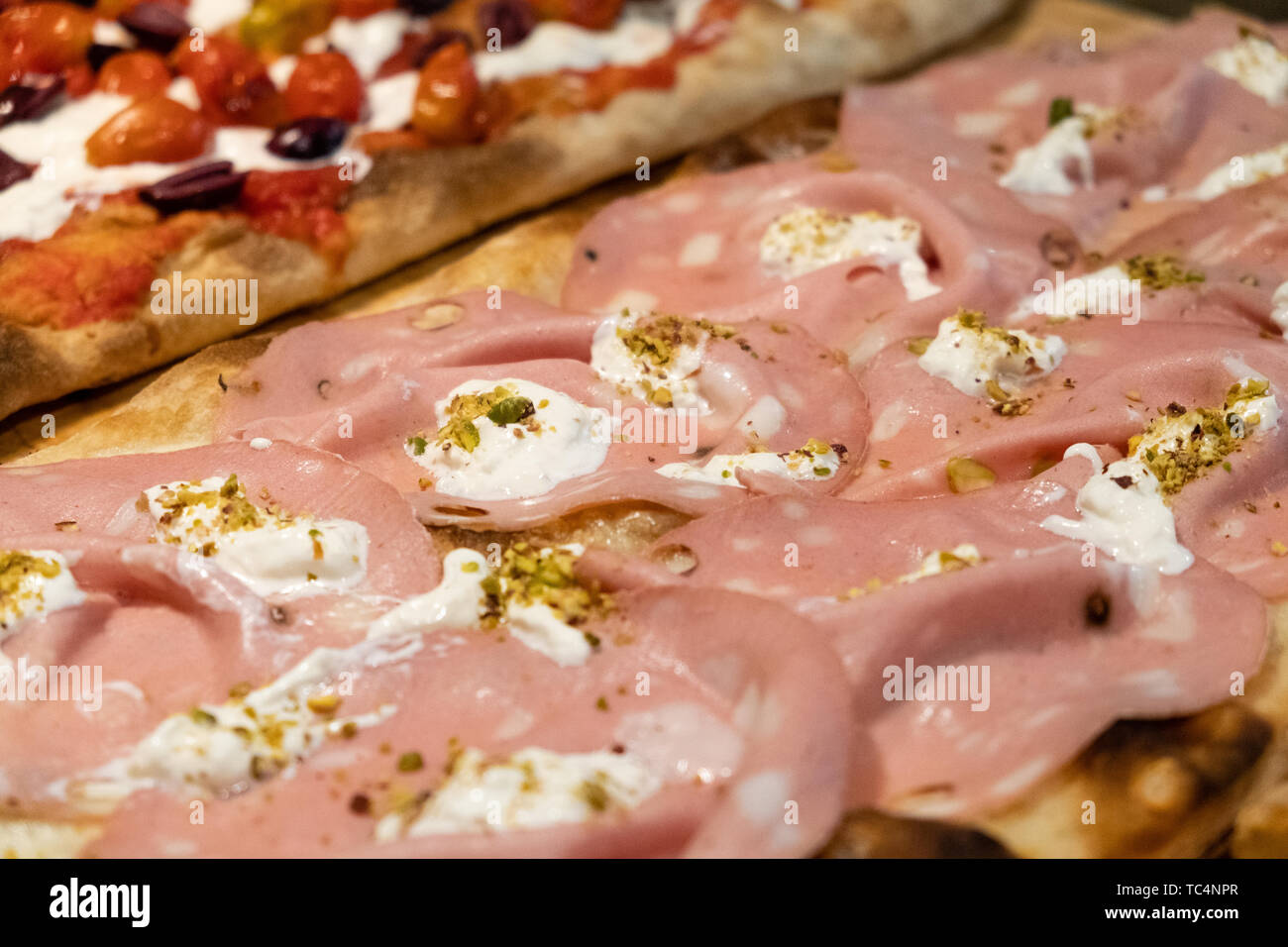 Roman style pizza in pala , high idration , sell by the slice in a