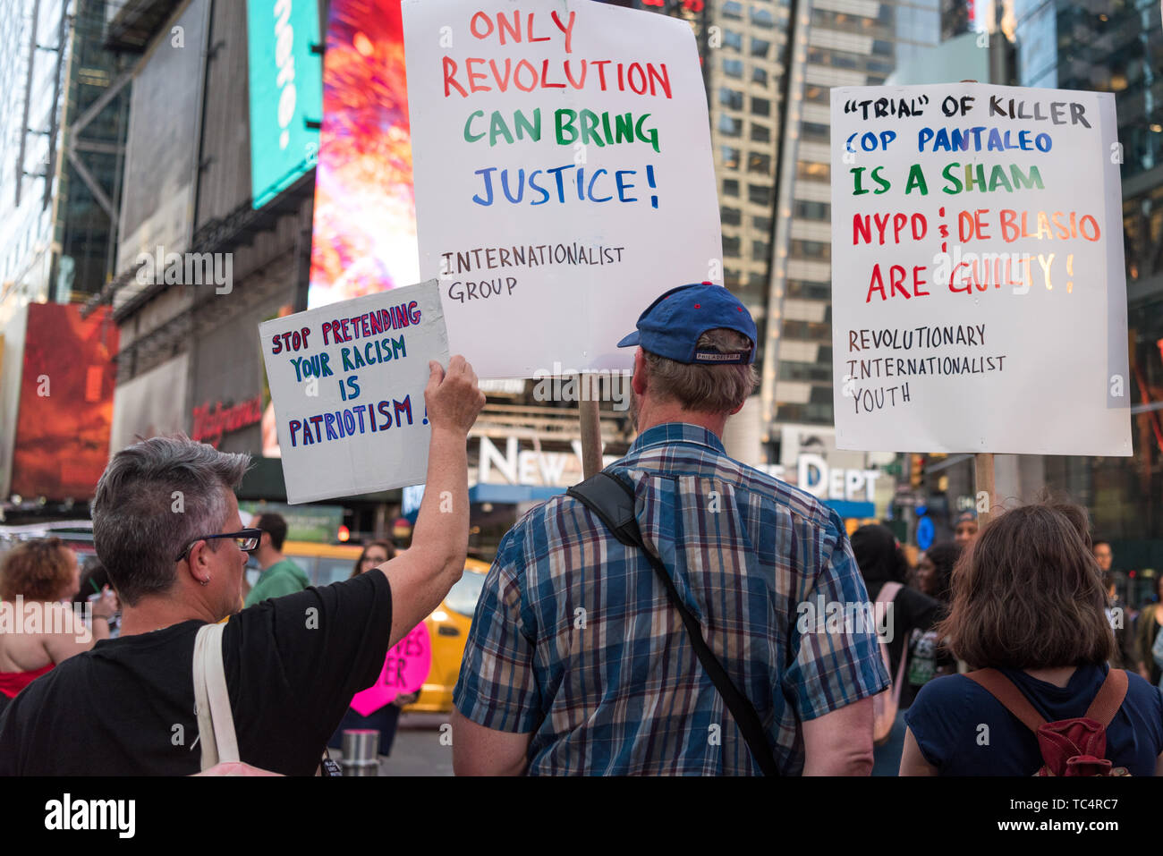 New York, United States. 04th June, 2019. On June 4, 2019, protesters rallied in Times Square in New York City demanding the firing of Officer Pantaleo for the choking death of Eric Garner in 2014. Daniel Pantaleo is currently standing administrative trial which began on May 13. On May 21, the judge overseeing his case delayed the remainder of the hearing until June 5, 2019. Pantaleo has been on desk duty since Eric Garner's death and could face penalties ranging from loss of vacation days to firing from the NYPD. Credit: Gabriele Holtermann-Gorden/Pacific Press/Alamy Live News Stock Photo