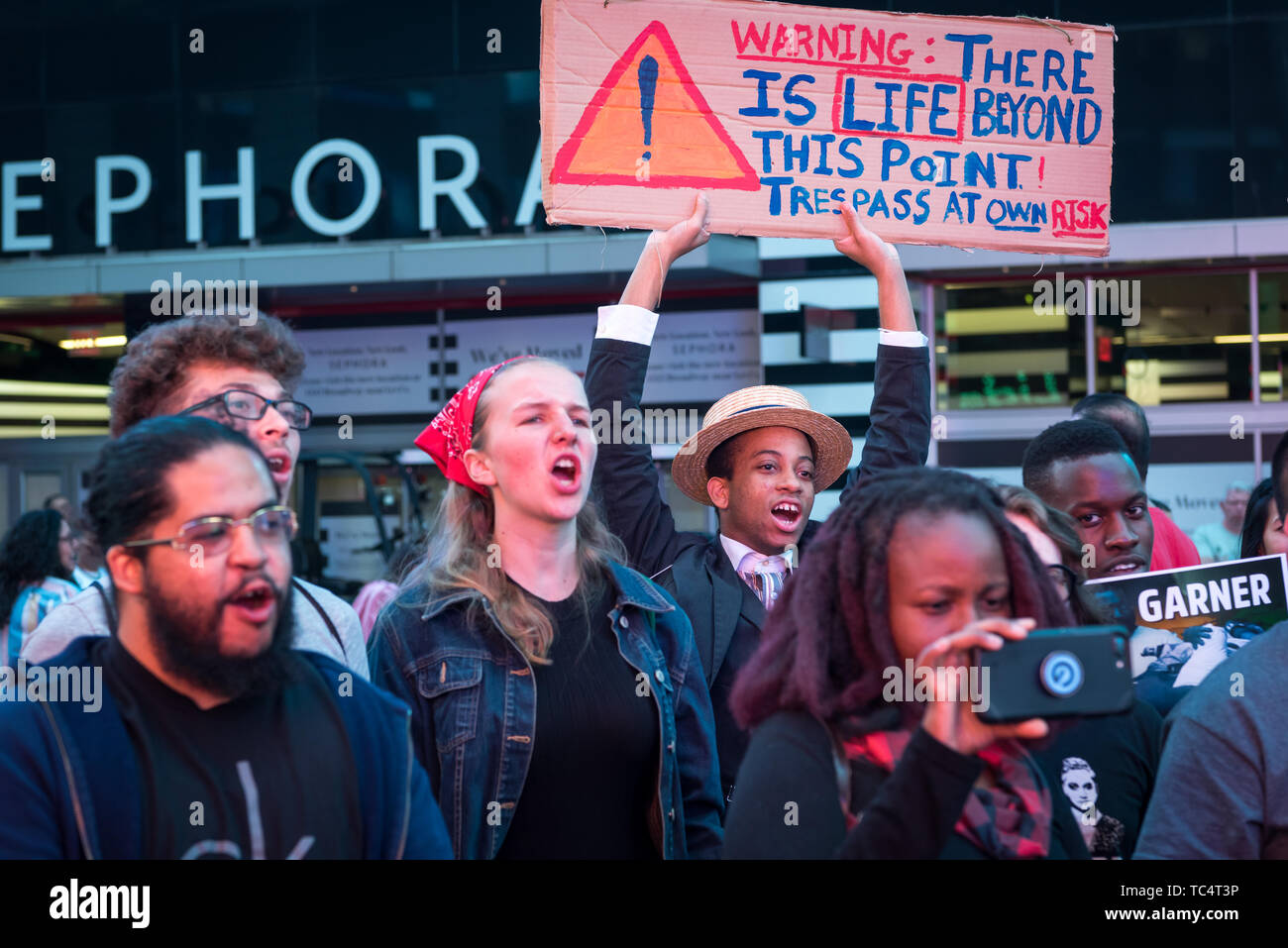 New York, United States. 04th June, 2019. On June 4, 2019, protesters rallied in Times Square in New York City demanding the firing of Officer Pantaleo for the choking death of Eric Garner in 2014. Daniel Pantaleo is currently standing administrative trial which began on May 13. On May 21, the judge overseeing his case delayed the remainder of the hearing until June 5, 2019. Pantaleo has been on desk duty since Eric Garner's death and could face penalties ranging from loss of vacation days to firing from the NYPD. Credit: Gabriele Holtermann-Gorden/Pacific Press/Alamy Live News Stock Photo