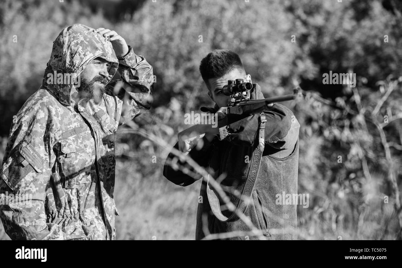 Poaching concept. Activity for brutal men. Hunters poachers looking for