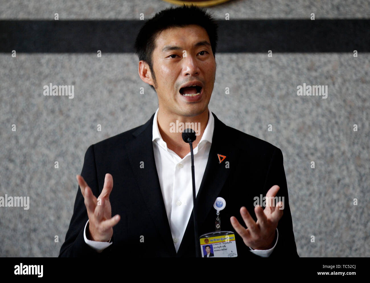 Thanathorn Juangroongruangkit, the Future Forward Party leader speaks while making a gesture at the news conference during the parliamentary vote for Thailand’s new prime minister, at the TOT Plc’ auditorium in Bangkok. Stock Photo
