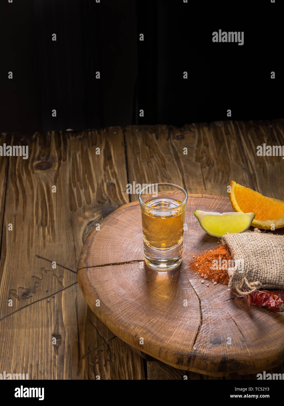 Mezcal mexican drink with orange, lime slices and worm salt in oaxaca ...