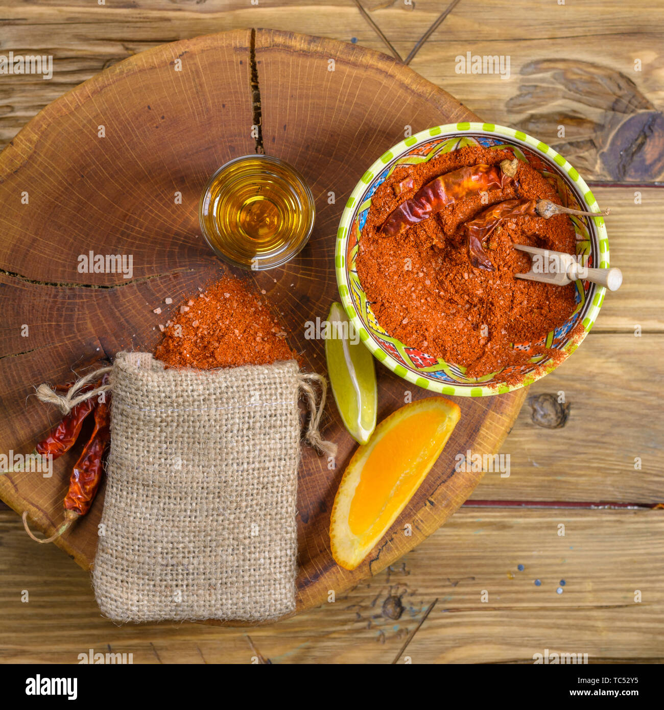 Mezcal mexican drink with orange, lime slices and worm salt in oaxaca ...