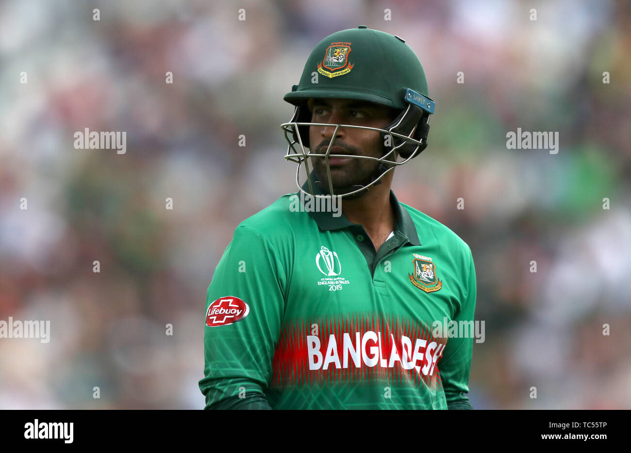 Bangladesh's Tamim Iqbal walks off after being dismissed during the ICC Cricket World Cup group stage match at The Oval, London. Stock Photo