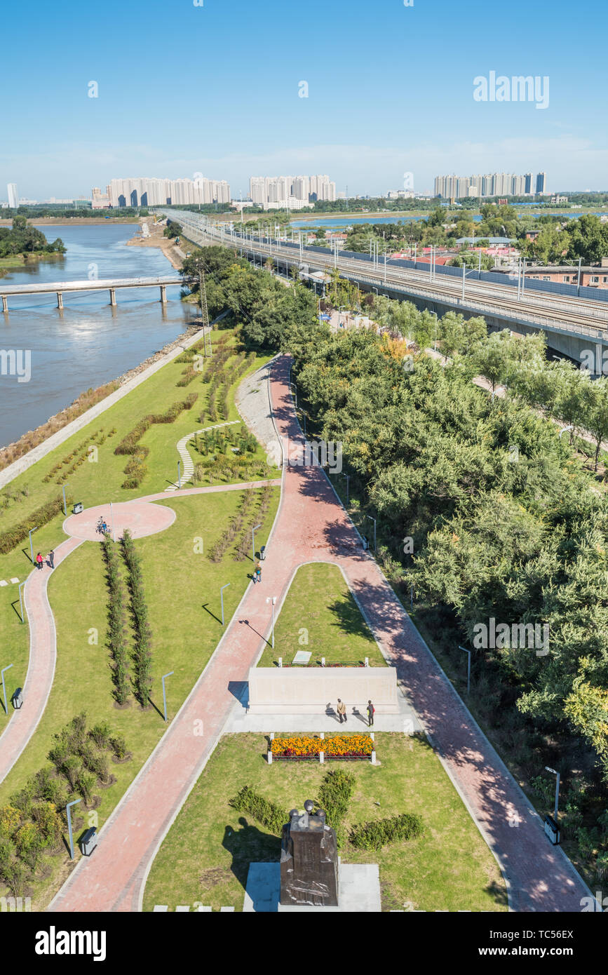 Songhua River Railway Bridge under Autumn Sunny Day in Harbin, China Stock Photo