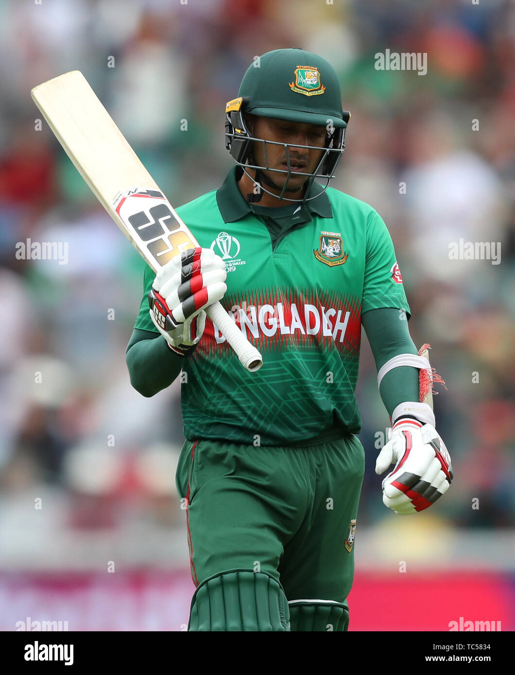 Bangladesh's Mohammad Mithun walks off after being dismissed during the ICC Cricket World Cup group stage match at The Oval, London. Stock Photo