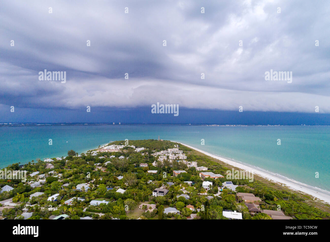 Sanibel Island Florida,Gulf of Mexico beach beaches,Lighthouse Beach Park Point Ybel,San Carlos Bay water,approaching storm clouds front,aerial overhe Stock Photo
