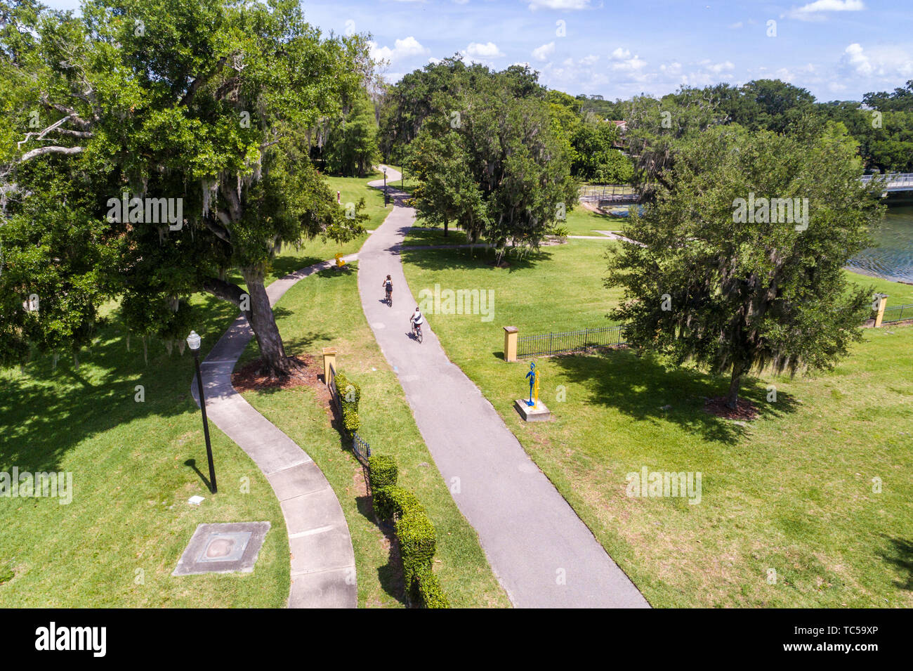 Orlando Florida,Loch Haven Park,bike path bikers bicycle riders cyclists,aerial overhead bird's eye view above,visitors travel traveling tour tourist Stock Photo
