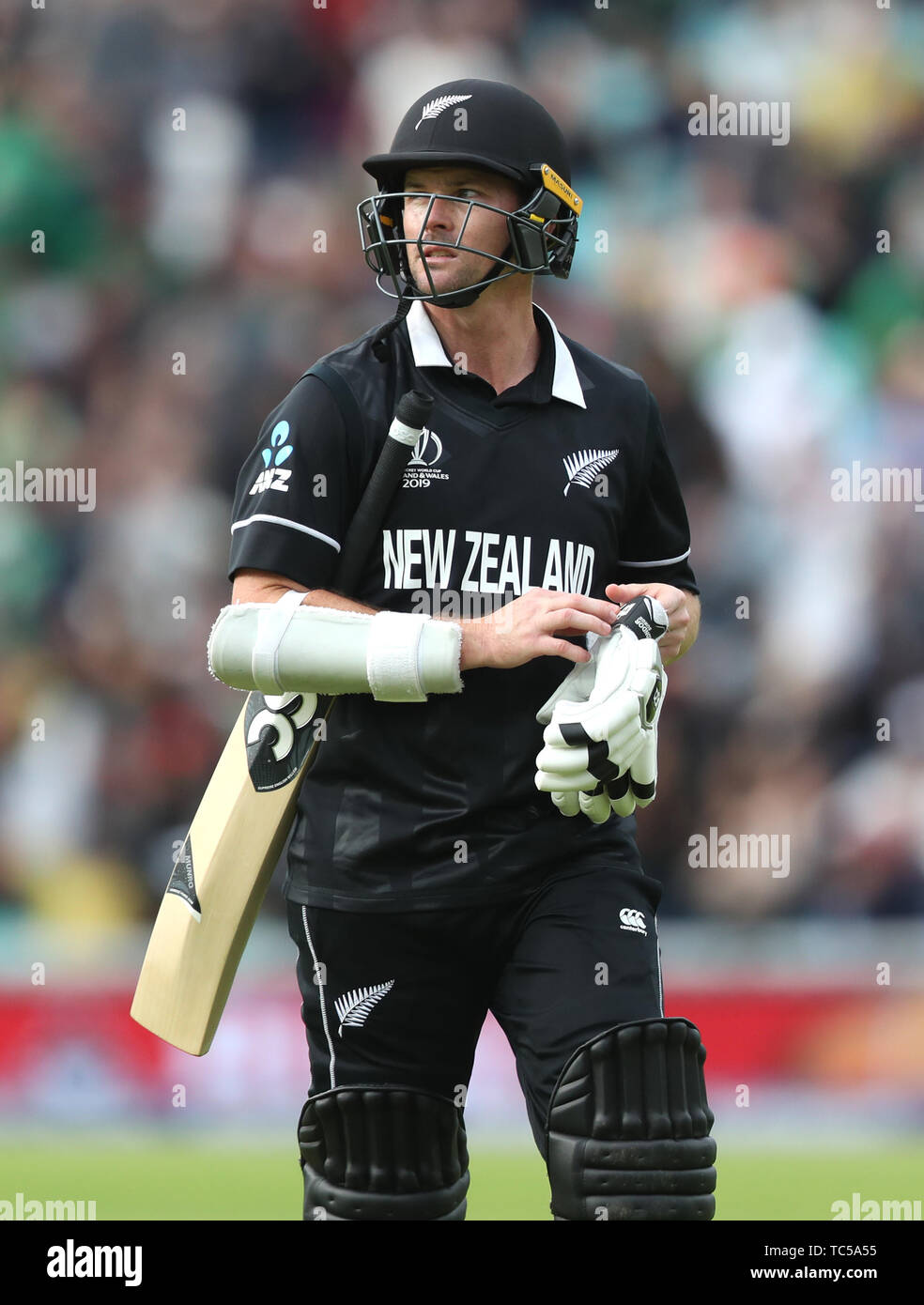 New Zealand's Colin Munro walks off after being dismissed during the ICC Cricket World Cup group stage match at The Oval, London. Stock Photo