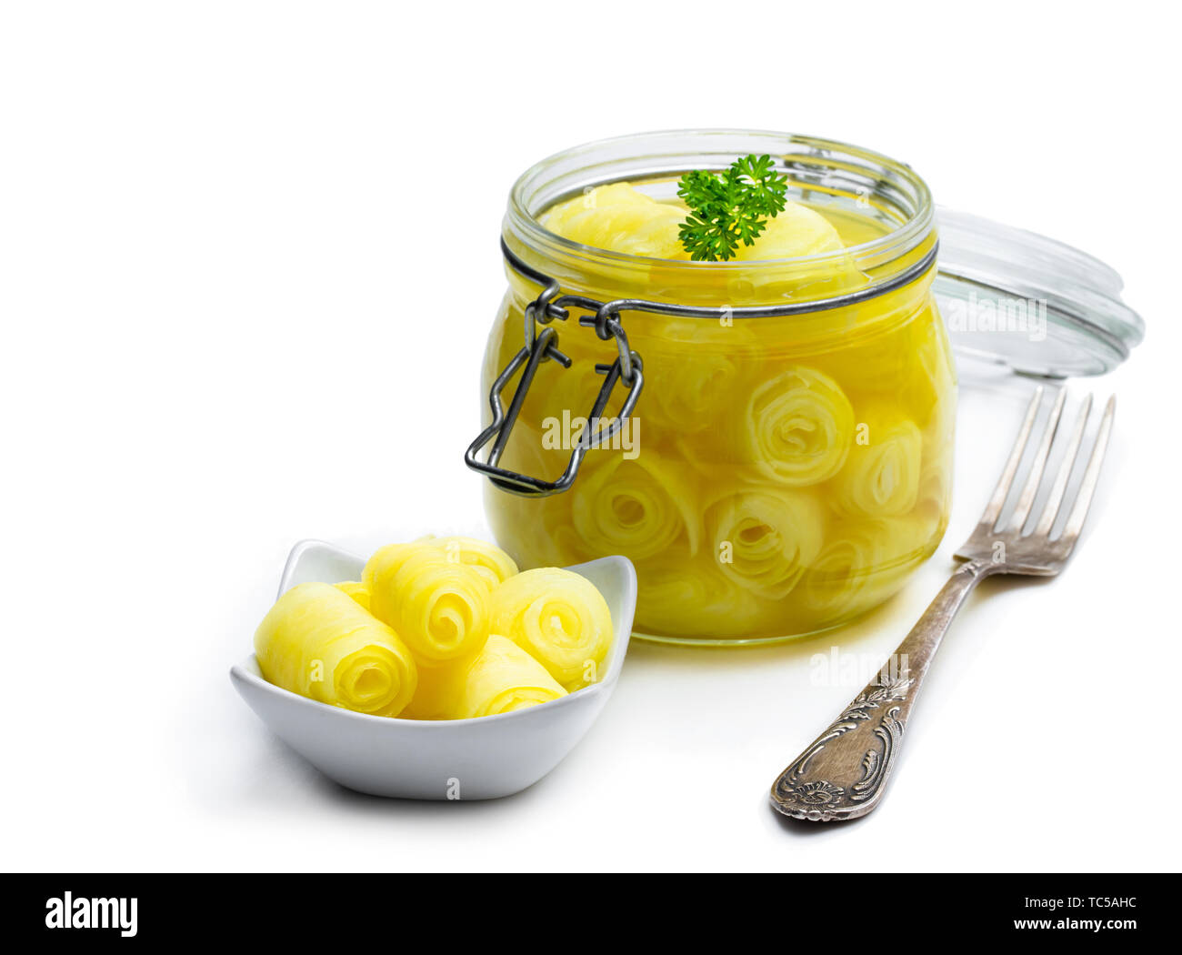 Marinated daikon isolated on white Stock Photo Alamy