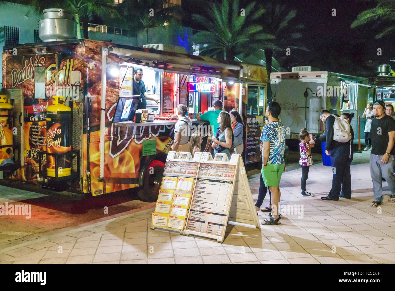 Miami Beach Florida,North Shore Beach,Ocean Terrace,Food Truck & Music Fest,monthly night evening dusk,street food,Hispanic man men male,woman female Stock Photo