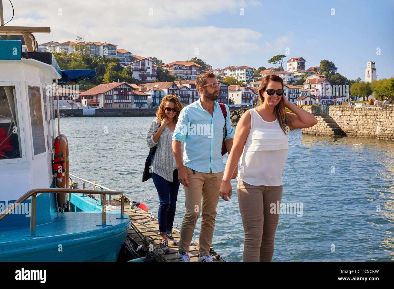 Guide with tourists, Tour, Basque Coast, Port, Sant Jean de Luz, Aquitaine, Pyrenees Atlantiques, France, Europe Stock Photo
