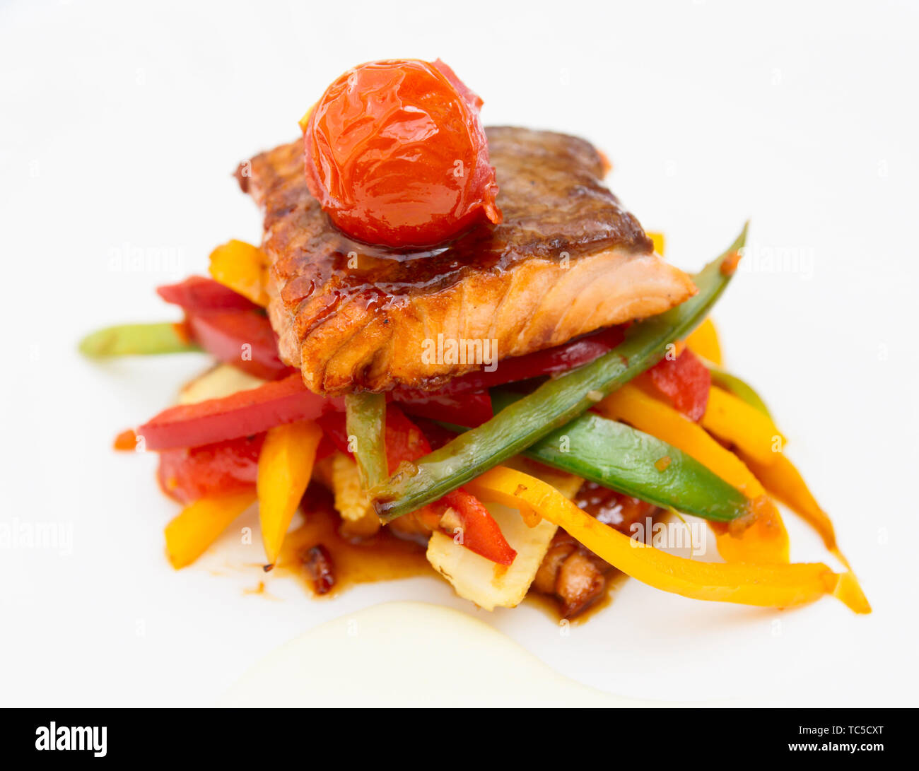 Delicious salmon dish with vegetables Stock Photo Alamy