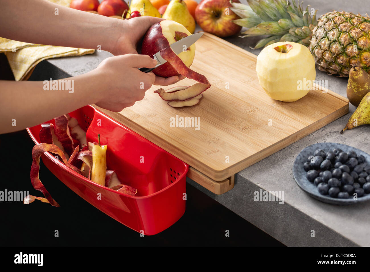 Preparing Fresh Mixed Fruit Salad. Healthy Eating Concept. Stock Photo