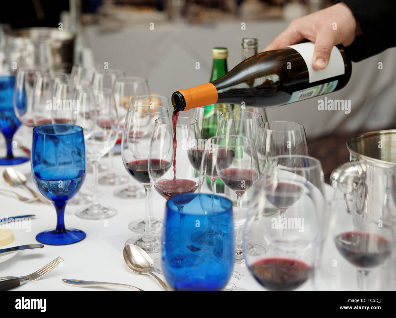 Waiter pouring wine hires stock photography and images Alamy