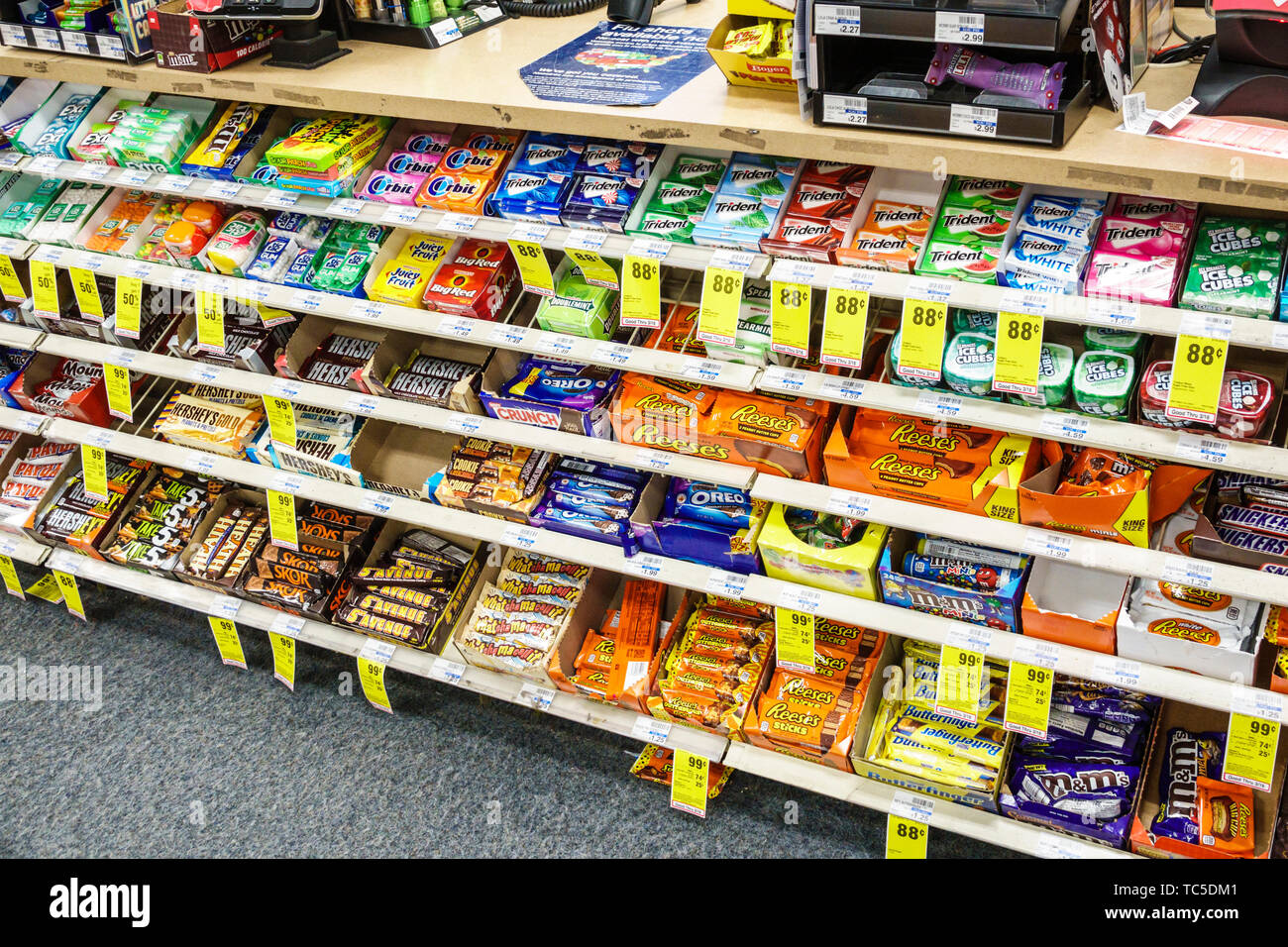 Miami Beach Florida,CVS Pharmacy drugstore,inside interior,product products display sale,candy bars chewing gum junk food,Trident Reese's m&m's Hershe Stock Photo