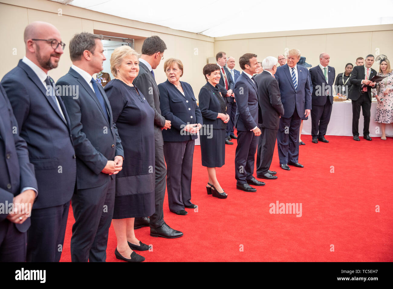 (left to right) Prime Minister of Belgium Charles Michel, Prime Minister of Luxembourg Xavier Bettel, Prime Minister of of Norway Erna Solberg, Prime Minister of the Netherlands Mark Rutte, German Chancellor Angela Merkel, Governor-General of New Zealand Patsy Reddy, President of France Emmanuel Macron, President of Greece Prokopis Pavlopoulos and US President Donald Trump, ahead of a meeting of leaders the Allied Nations at the 75th Anniversary of the D-Day landings at Southsea Common, Portsmouth. Stock Photo