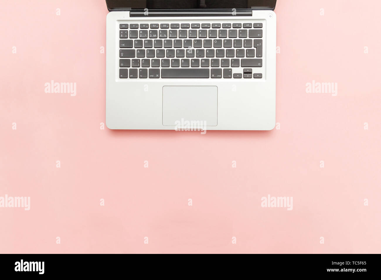 Keyboard laptop computer isolated on pink pastel desk background ...