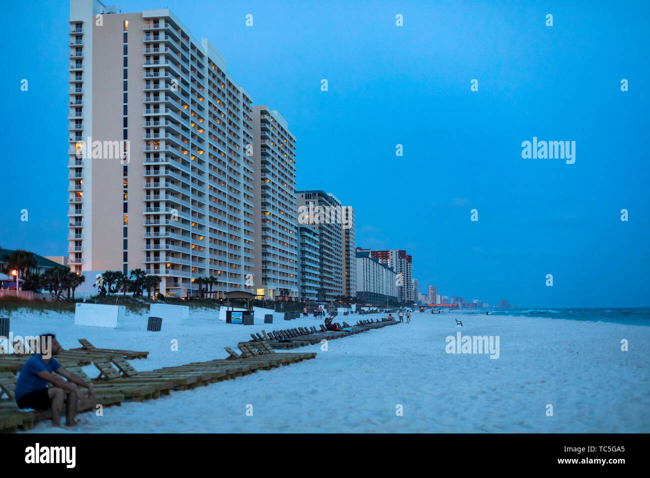 Panama City Beach, Florida - Twilight on the Gulf of Mexico beach, which is lined with high rise condominiums and resorts. Stock Photo