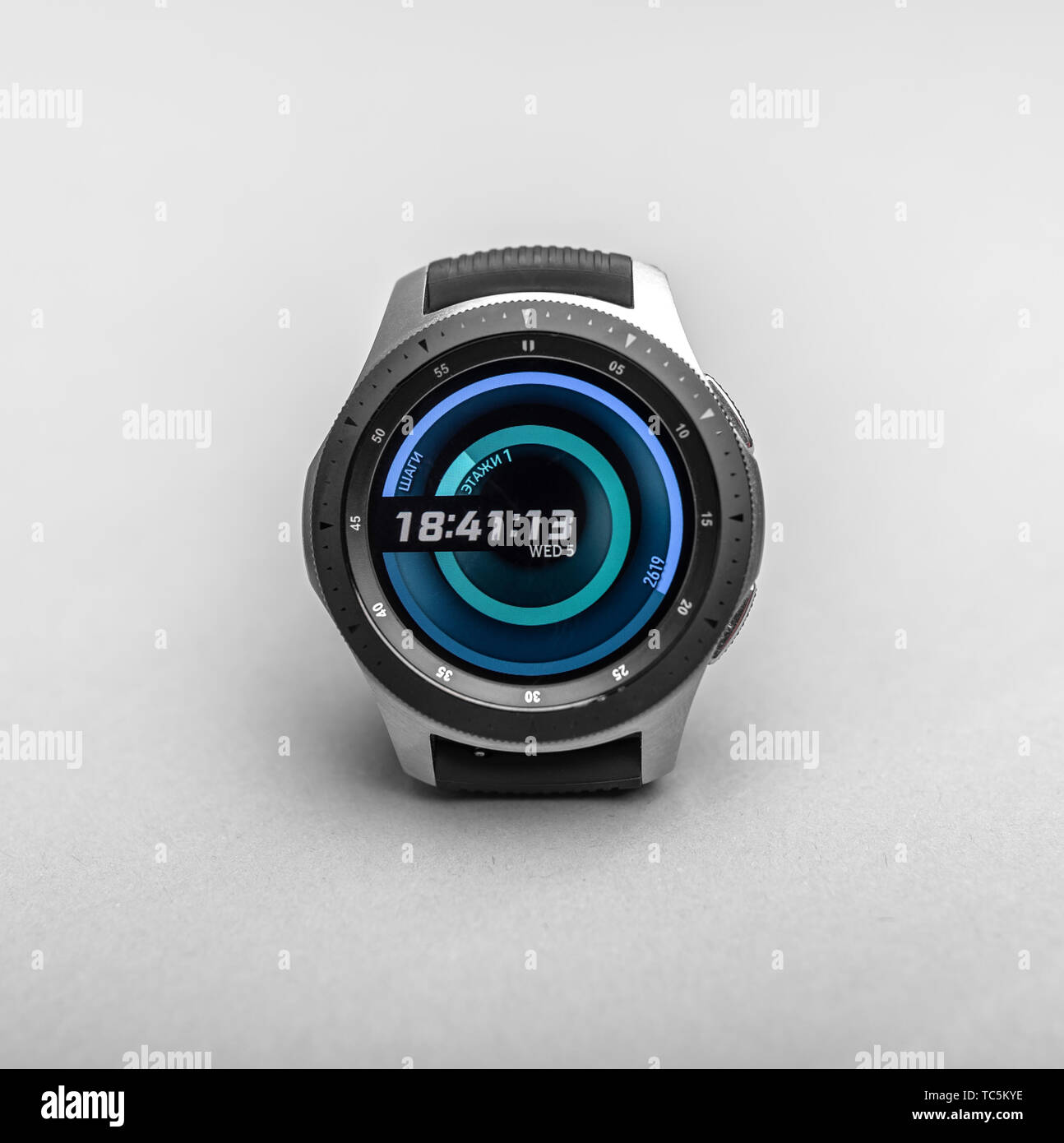 Smart watch Samsung Galaxy Watch on a gray background. Stock Photo