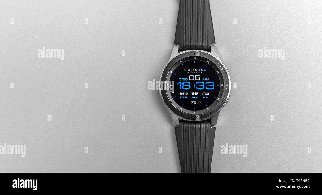 Smart watch Samsung Galaxy Watch on a gray background. Stock Photo