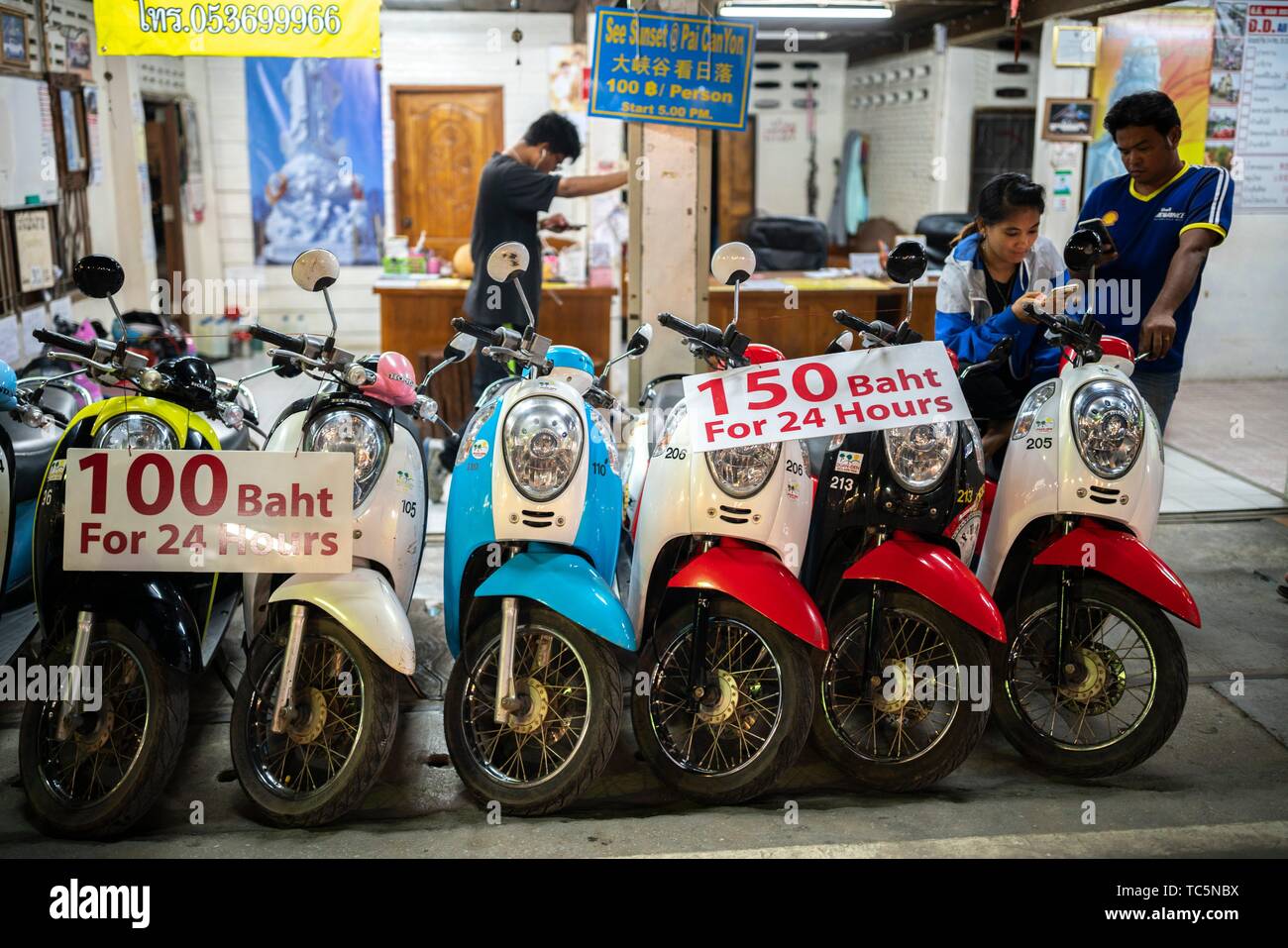 Motor bikes for rent at Pai night market, Northern Thailand Stock Photo
