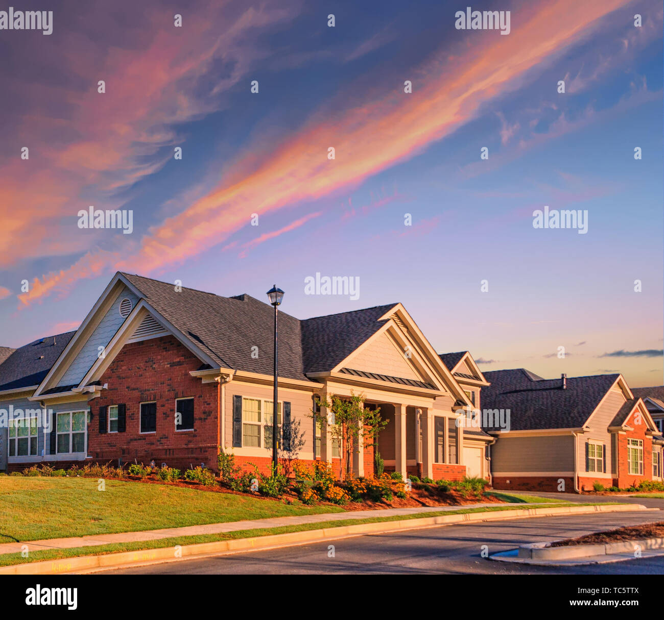 Sunrise Over New Homes Stock Photo Alamy
