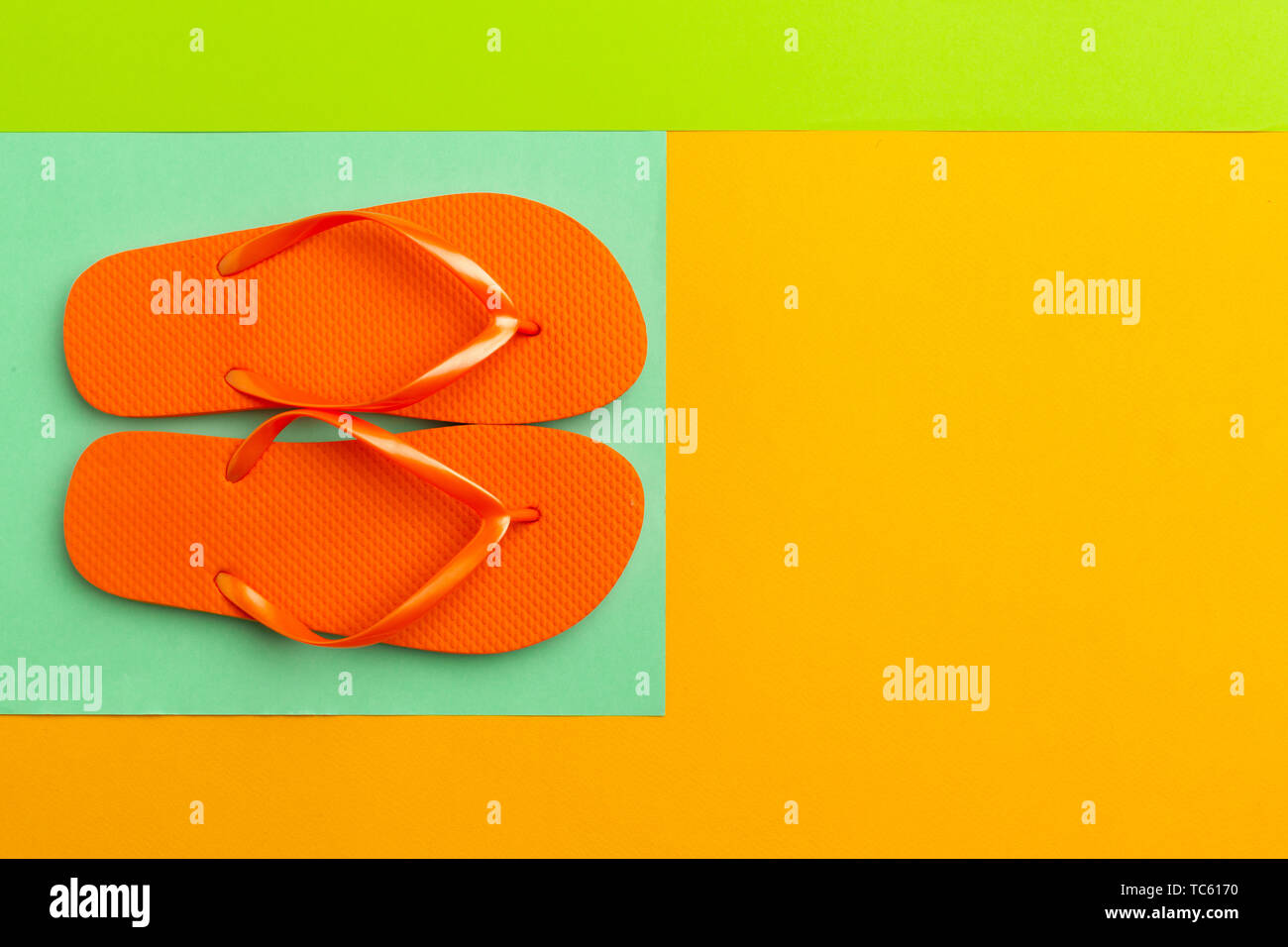 Female flip flops on a colorful vibrant background Stock Photo - Alamy
