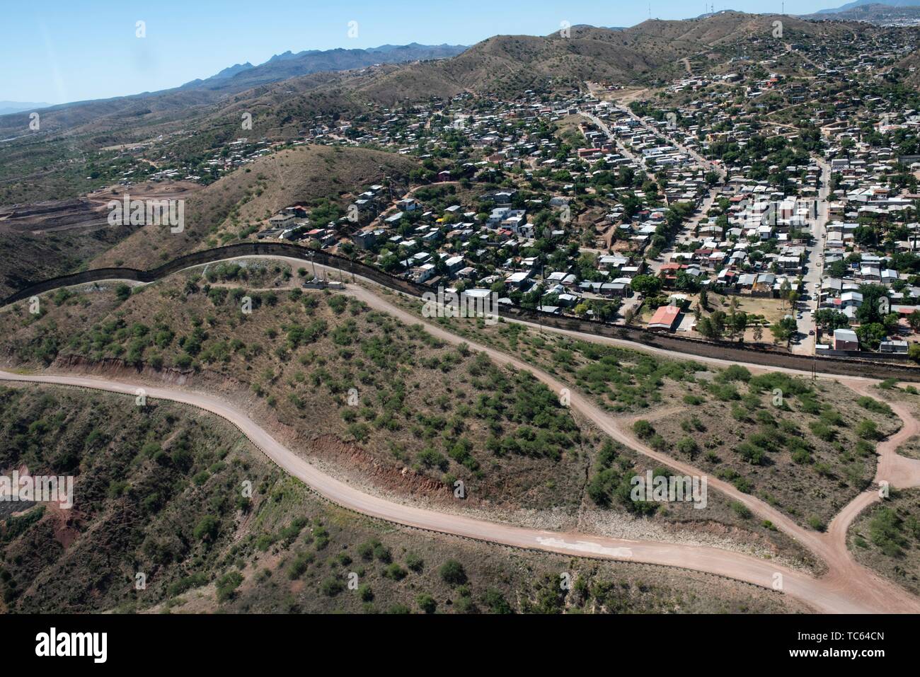 Aerial view of the U.S. border along the town of El Sasabe, Sonora, Mexico  from a U.S. Customs and Border Patrol UH-60 Blackhawk helicopter May 29,  2019 over Sasabe, Arizona Stock Photo - Alamy