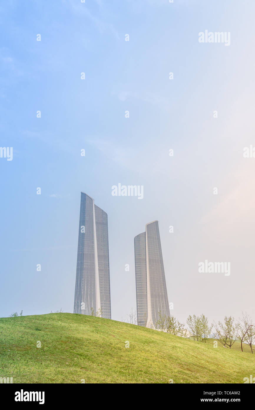 Landside lawns and landmark buildings under sunset in Nanjing Stock Photo