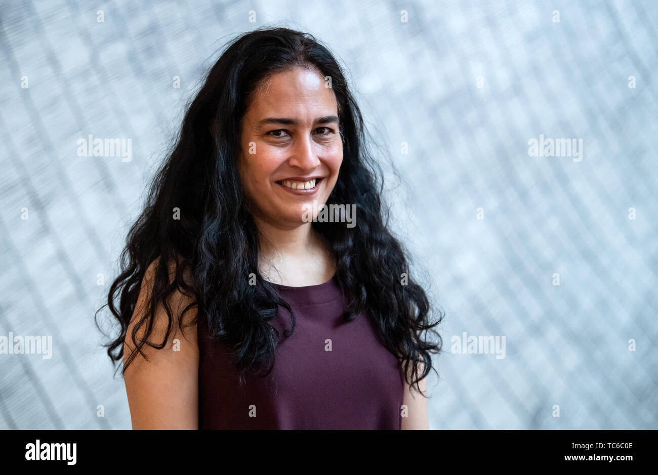 Berlin, Germany. 05th June, 2019. The artist Bani Abidi is standing at the Gropius Bau on the occasion of the opening press conference of her exhibition entitled 'They Died Laughing'. The exhibition (06.06.2019 to 22.09.2019) is a comprehensive presentation of Abidi's work and shows her films and prints from over ten years. The Pakistani artist is known for her unmistakable film aesthetic, which is marked by the dark absurdities of everyday life. Credit: Bernd von Jutrczenka/dpa/Alamy Live News Stock Photo