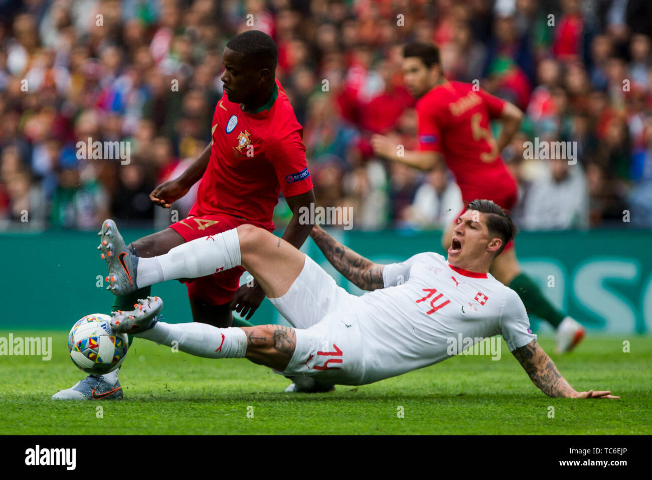 Porto, Portugal. 05th June, 2019. 5th June 2019; Porto, Portugal; UEFA Nations League International football, semi-final, Portugal versus Switzerland; William Carvalho of POR tackles St Zuber of SUI Credit: Action Plus Sports Images/Alamy Live News Stock Photo
