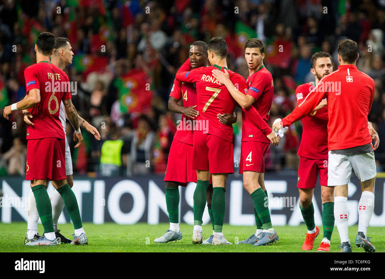 Porto, Portugal. 05th June, 2019. UEFA Nations League International football, semi-final, Portugal versus Switzerland; Ronaldo of POR celebrates the victory with Ruben Dias and William Carvalho Credit: Action Plus Sports Images/Alamy Live News Stock Photo