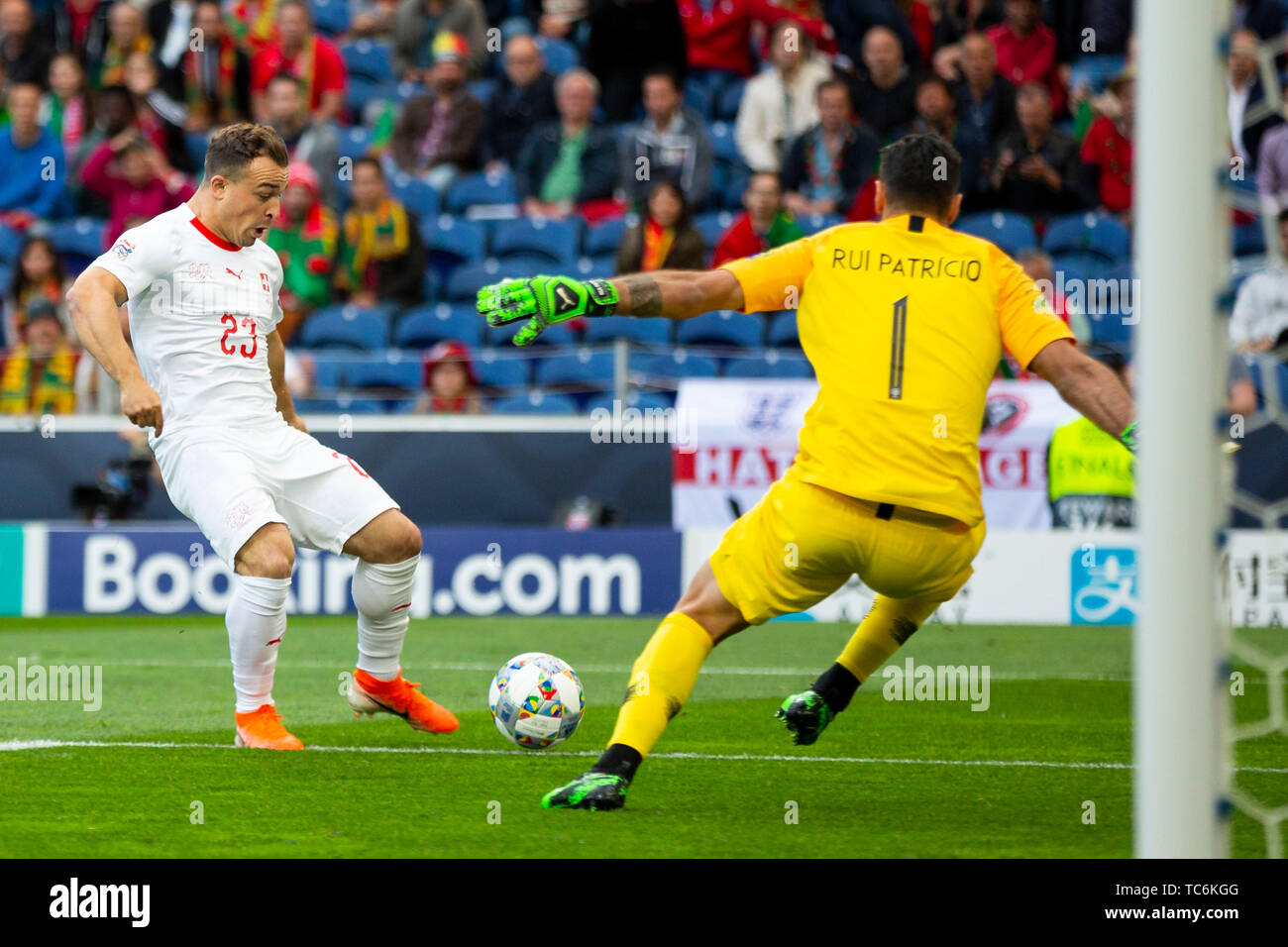 Porto, Portugal. 05th June, 2019. Portugal's goalkeeper, Rui Patricio (R) and Switzerland's player, Xherdan Shaqiri (R) in action during the the UEFA Nations League Finals at Dragon Stadium in Porto, Portugal. ( Portugal 3:1 Switzerland ) Credit: SOPA Images Limited/Alamy Live News Stock Photo