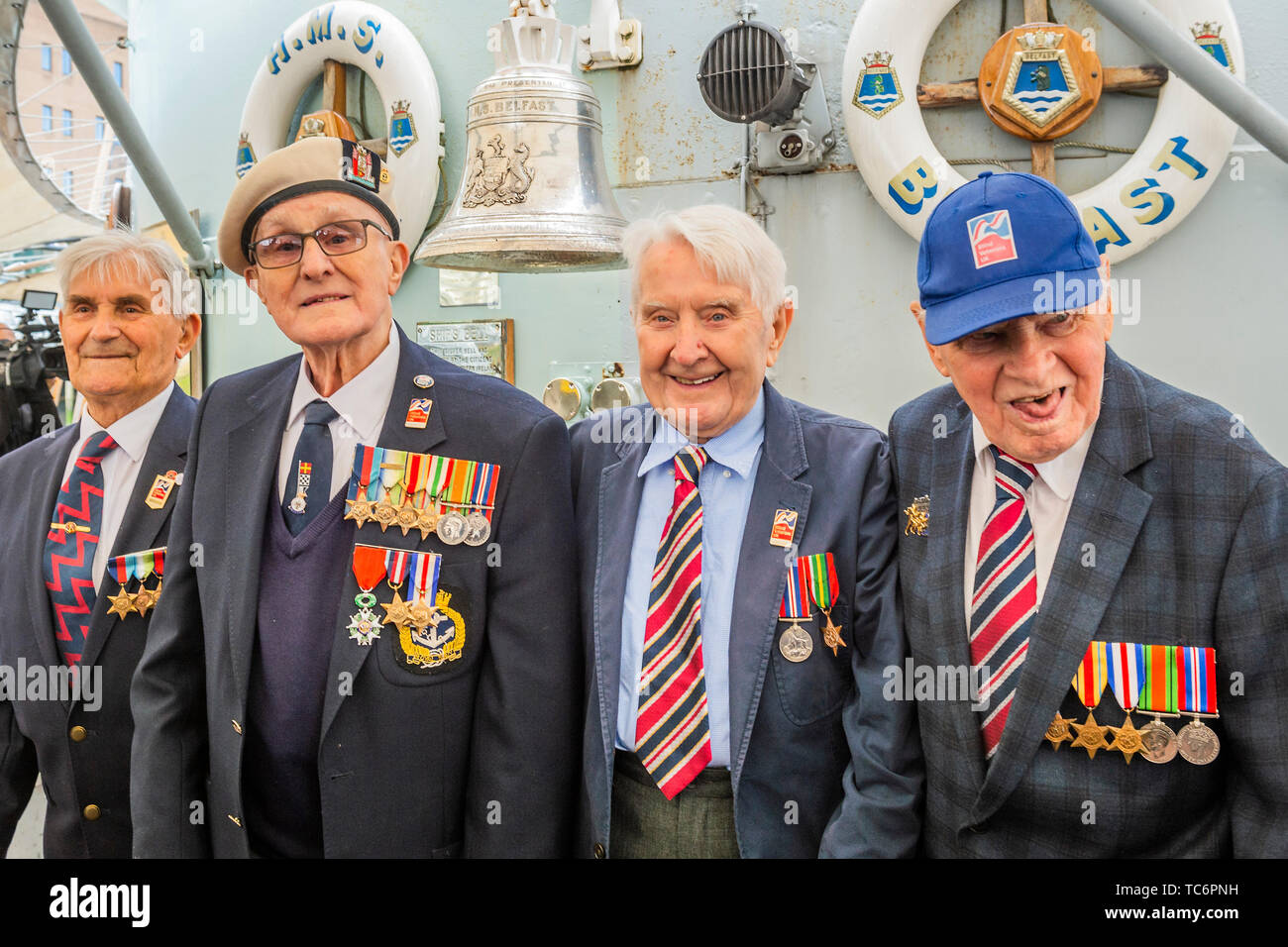 London, UK. 06th June, 2019. Arthur Barnes, John Connelly, Nev Lees and Bob Jones - D-Day Veterans from the Blind Veterans Association - Imperial War Museums marks the 75th anniversary of the D-Day landings on board HMS Belfast. Credit: Guy Bell/Alamy Live News Stock Photo
