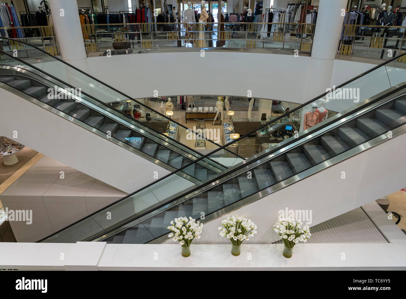 Escalators in a shopping mall in the El Paseo shopping district in Palm ...