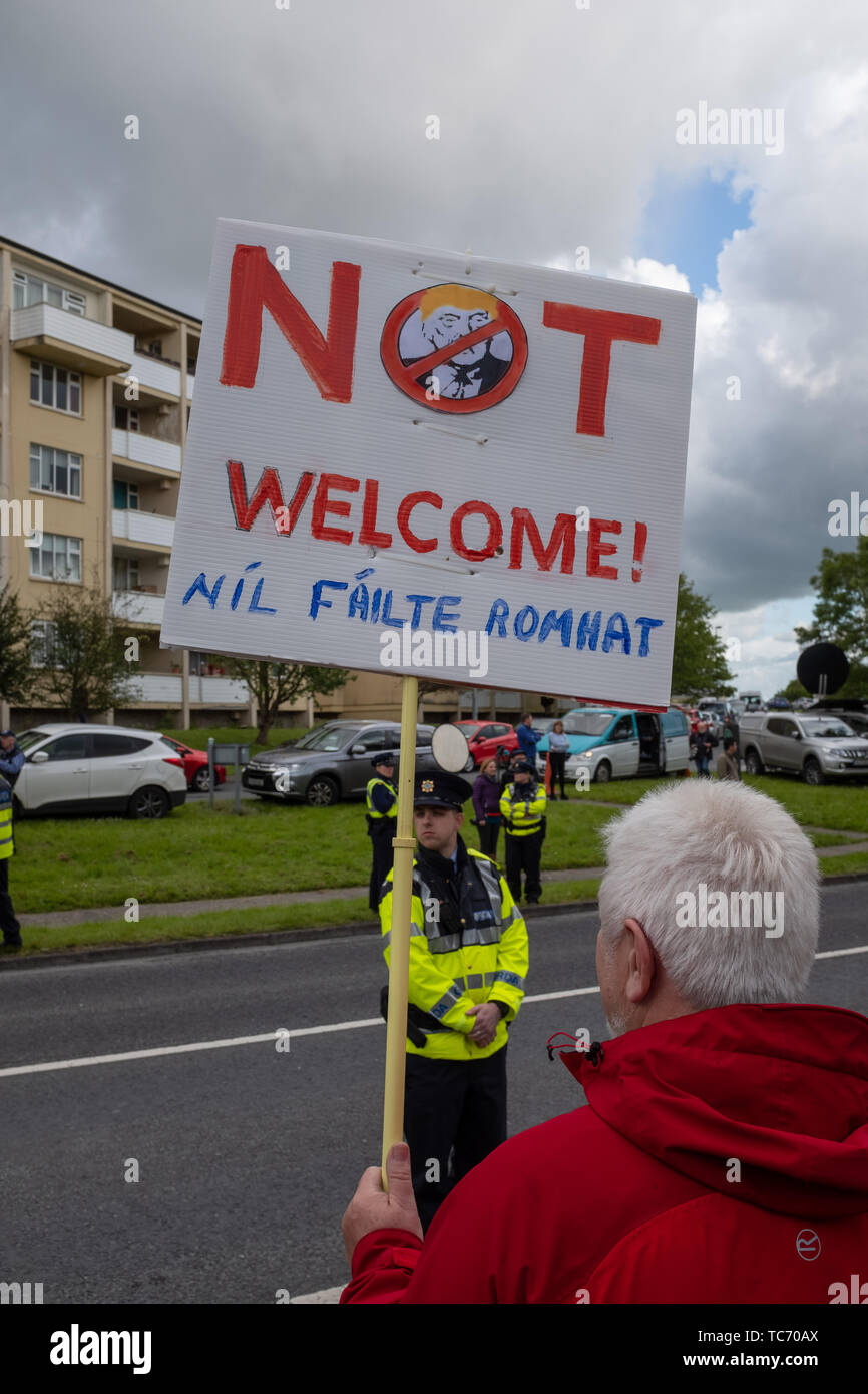 Shannon, Ireland, June. 5, 2019: A protestor with placards protesting against the Donald Trump visit at Shannon Airport, Ireland Stock Photo