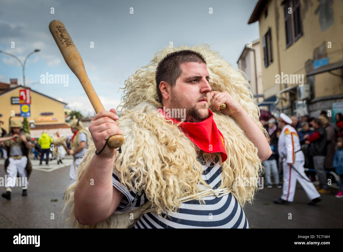 Matulji, Croatia - 3rd February, 2019 : Traditional carnival parade of bellringers with big cattle bells passing thru the street of Matulji, during th Stock Photo