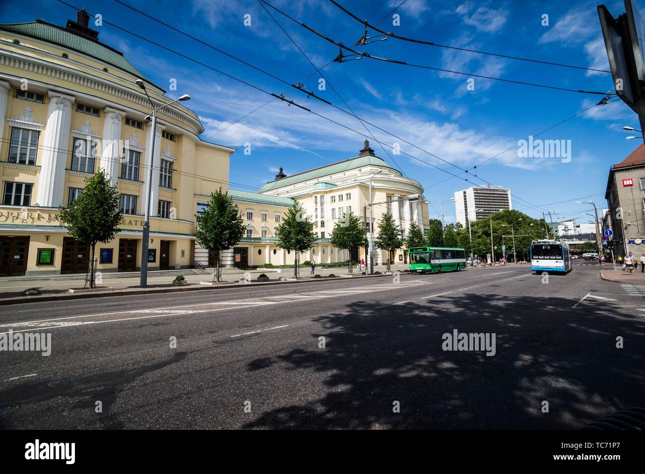 Public transportation flowing along the Estonian National Opera and
