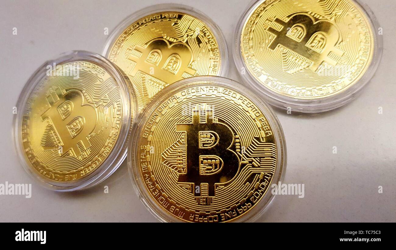 Bitcoin (BTC) is known as the first open-source, peer-to-peer, digital cryptocurrency that was developed and released by a group of unknown Stock Photo