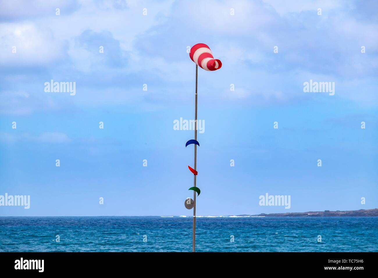Windsock showing the wind direction but also the wind force in the Beaufort scale, Las Palmas de Gran Canaria. Stock Photo