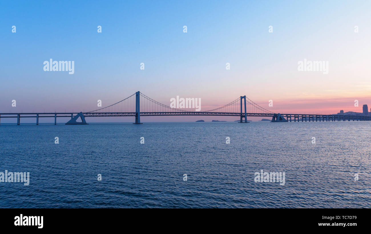 Sunset of the Dalian Star Bay Cross-Sea Bridge. Stock Photo