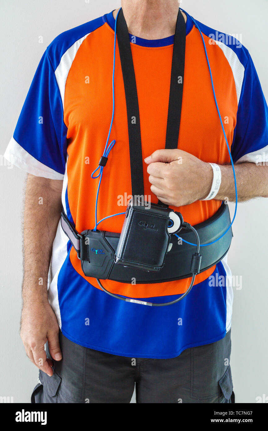 Miami Beach Florida,man men male,wearing capsule endoscopy sensor belt monitor,hospital wristband,FL190331056 Stock Photo