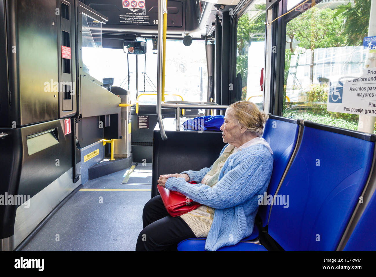 Miami Beach Florida,Miami-Dade Metrobus,bus inside onboard,senior seniors citizen citizens,Hispanic woman female women,rider passenger,FL190331095 Stock Photo