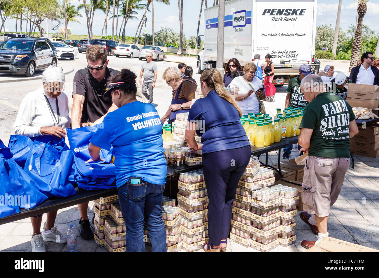 Miami Beach Florida,North Beach,Ocean Terrace,Farm Share food giveaway free distribution needy low income,volunteer volunteers volunteering work worke Stock Photo