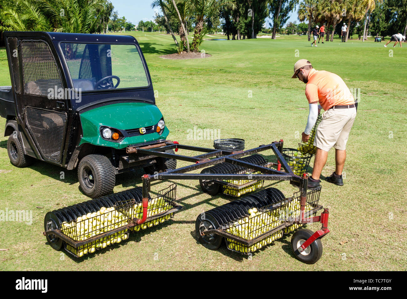 Miami Beach Florida,Normandy Shores Public Golf Club Course,driving range ball collector,man men male,job,working work worker workers employee employe Stock Photo