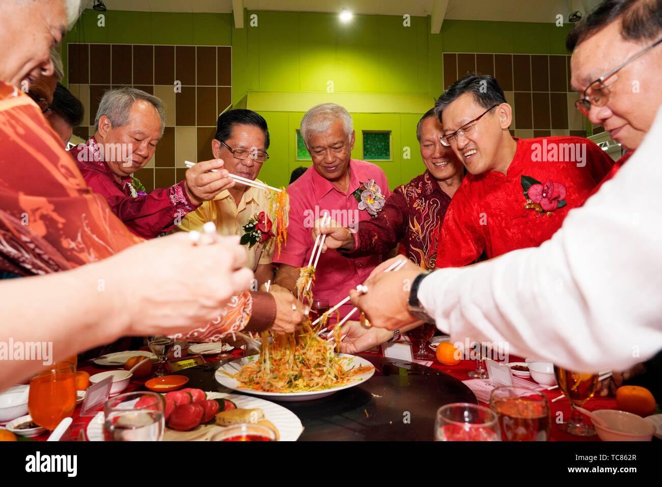 Chinese New Year 'lau yee-sang' dinner at Sungai Maong Community hall