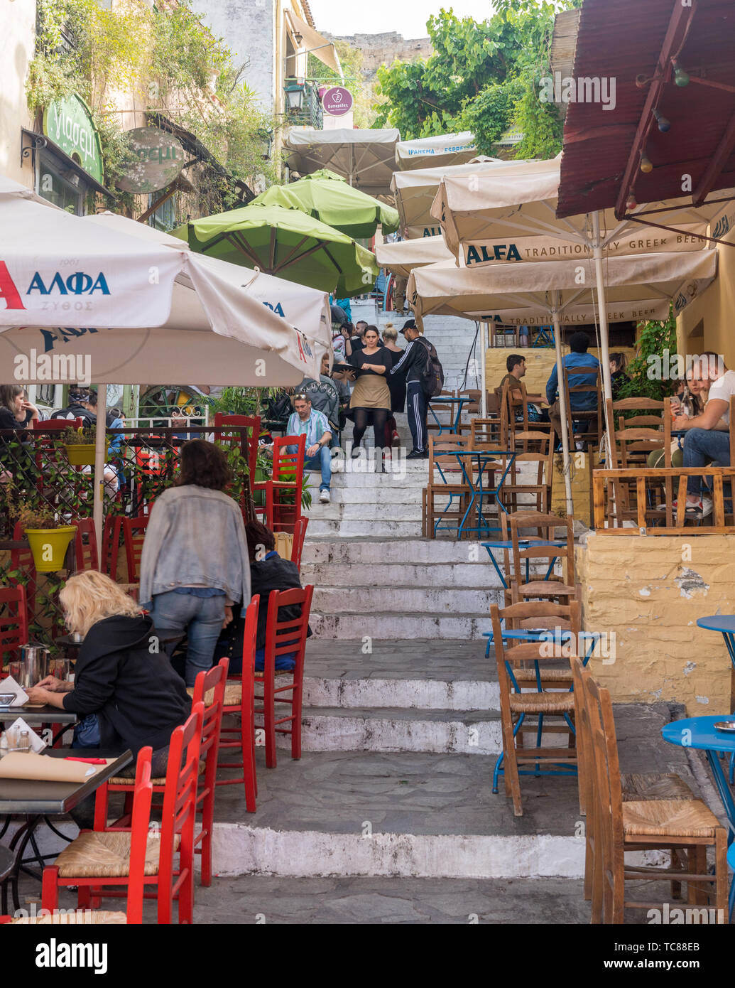 Tavernas in ancient residential district of Plaka in Athens Greece Stock Photo
