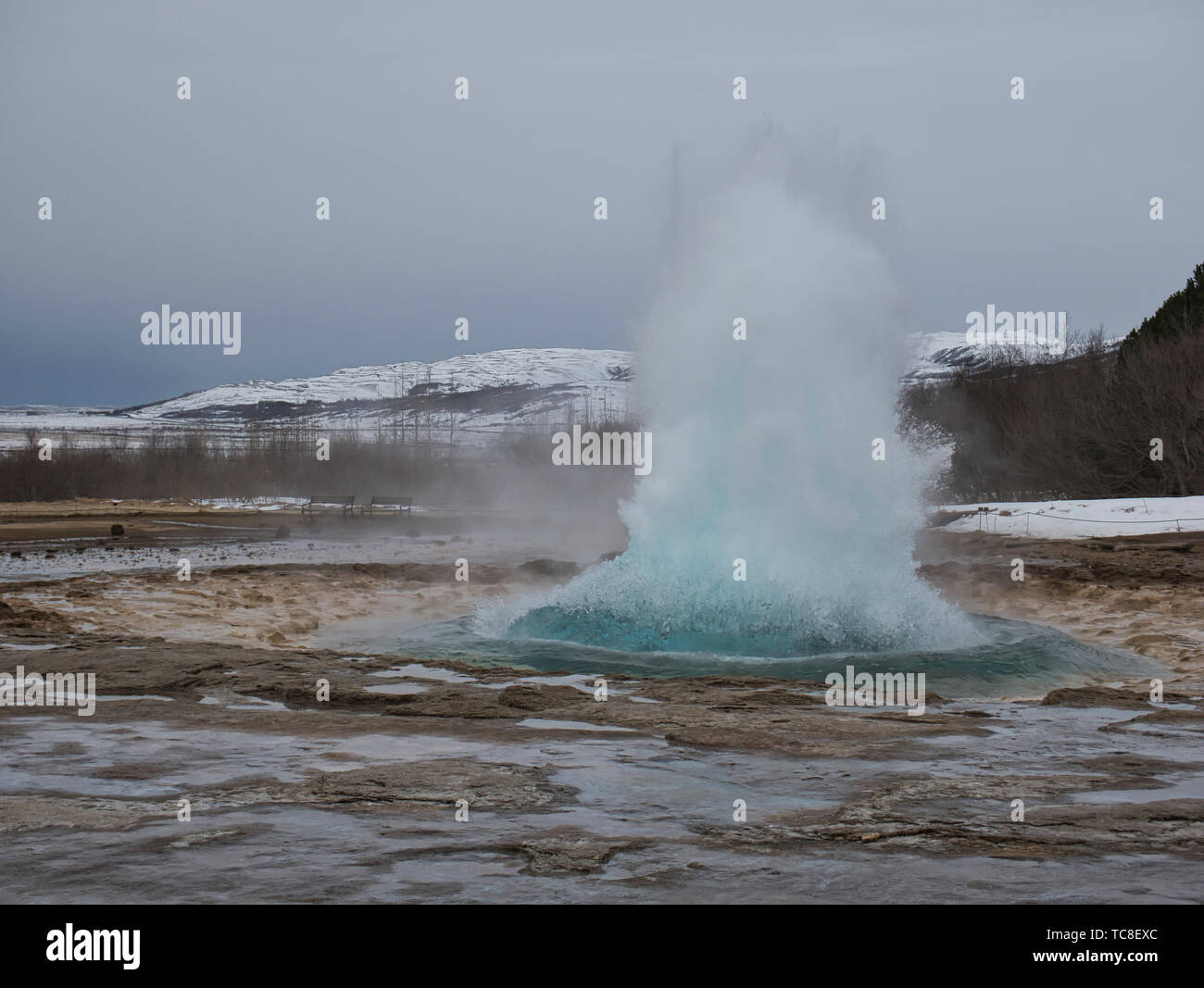 The outbreak of Strokkur Geysir at Golden Circle in winter Stock Photo ...