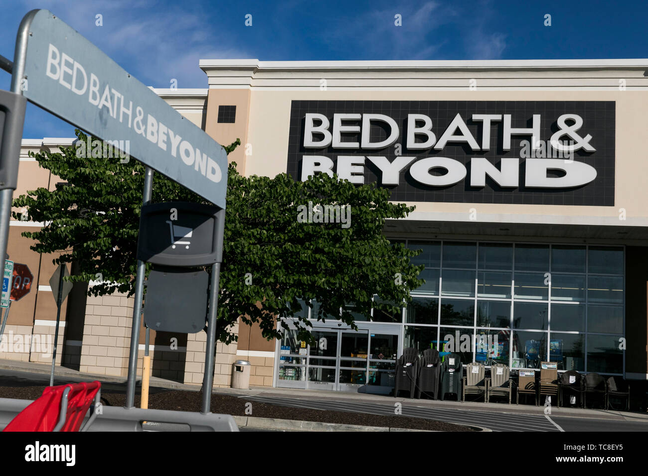 A logo sign outside of a Bed Bath & Beyond retail store location in
